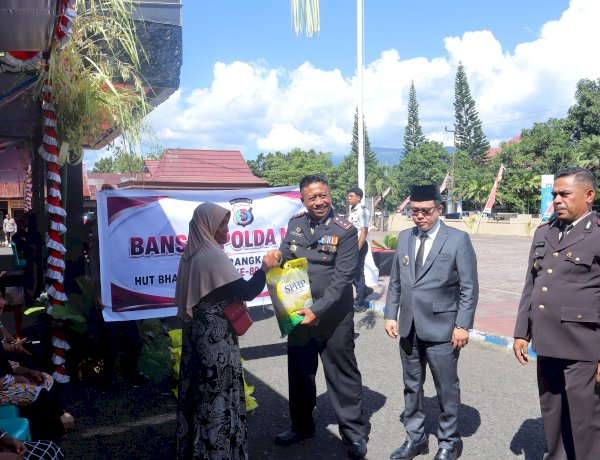 HARI BHAYANGKARA KE-80, POLRES ALOR WUJUDKAN KEPEDULIAN DENGAN MENYALURKAN BANTUAN BERAS KEPADA  MASYARAKAT
